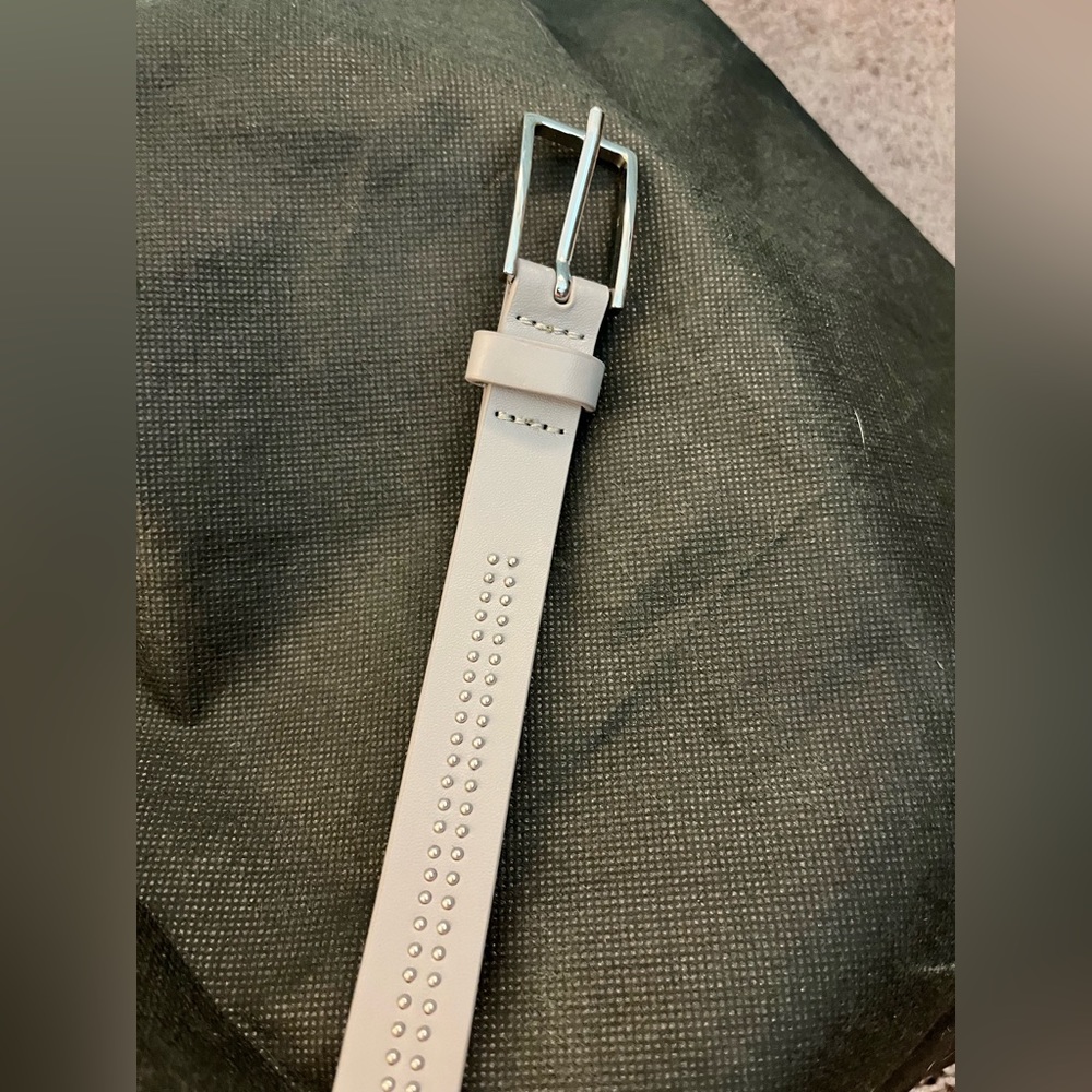 Banana Republic gray leather belt with silver accents. Size small.